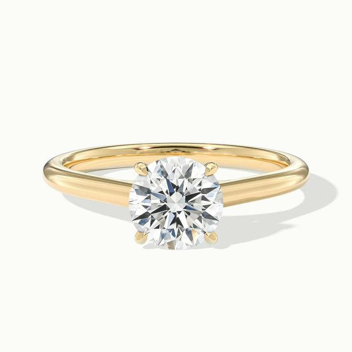 Nia 2 Carat Round Cut Solitaire Moissanite Engagement Ring in 10k Yellow Gold
