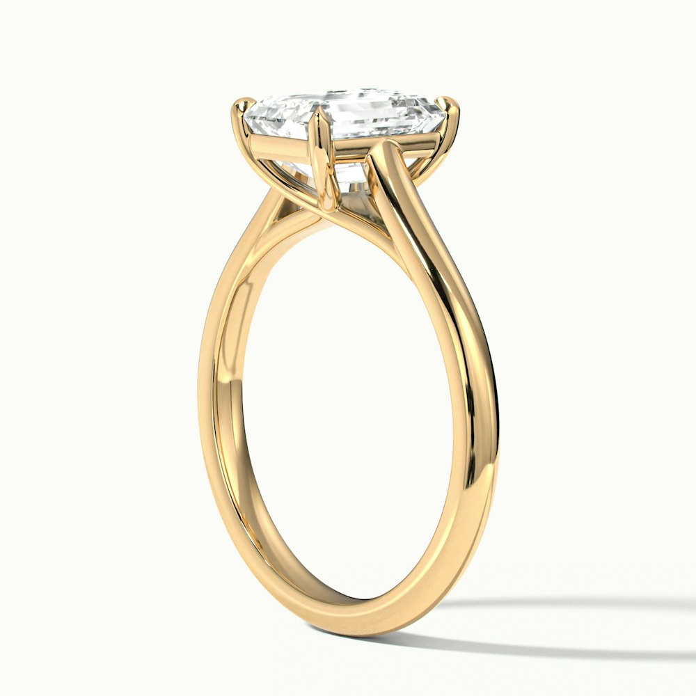 Ira 5 Carat Emerald Cut Solitaire Moissanite Engagement Ring in 18k Yellow Gold