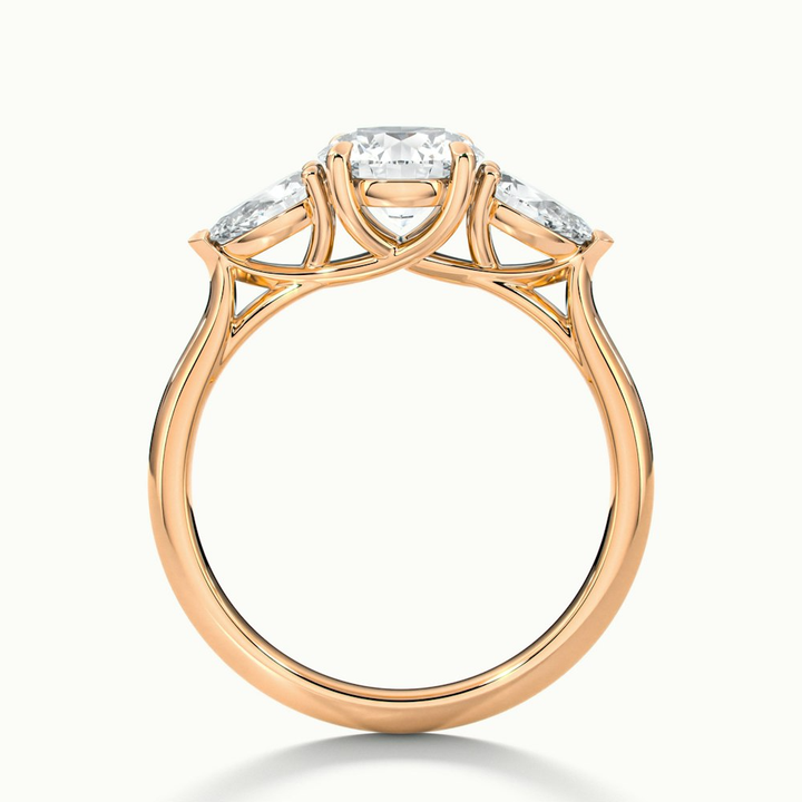 Amaya 5 Carat Round 3 Stone Moissanite Diamond Ring With Pear Side Stone in 18k Rose Gold